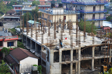 Nepalese people working construction of building at Pokhara