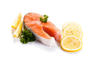 Fresh raw salmon fillet on white background