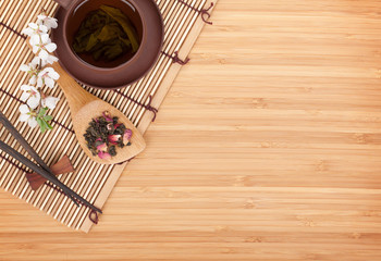 Japanese green tea and sakura branch