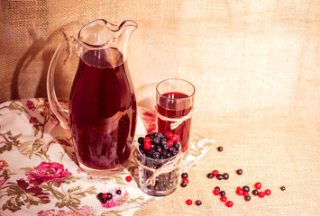 glass with berries and fruit compote