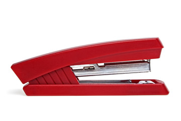 Red stepler isolated on a white background