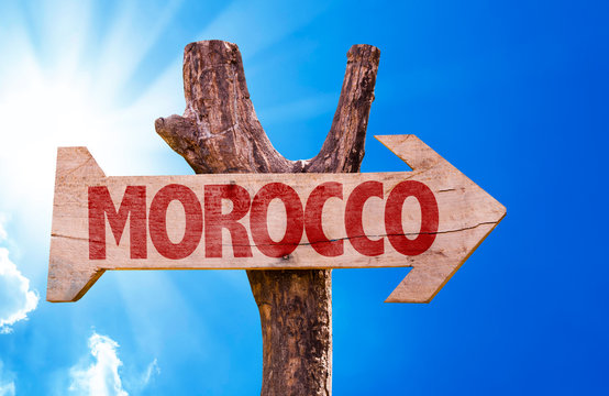 Morocco wooden sign with sky background