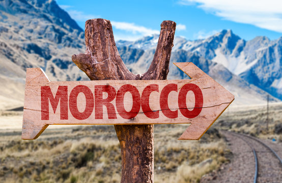 Morocco wooden sign with desert background