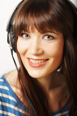 Young happy woman with headphones