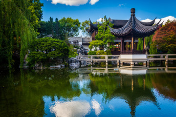 Pagoda reflecting in a pond at the Lan Su Chinese Garden, in Por