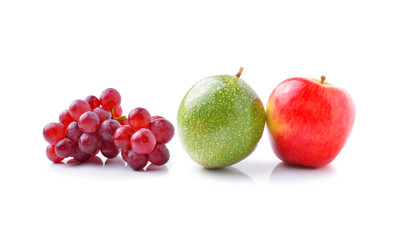 apple ,passion fruits and grape isolated on white