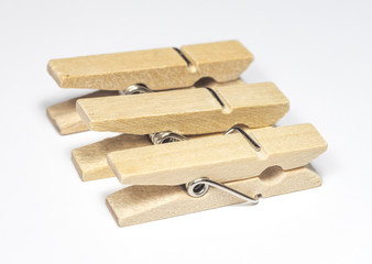Wooden Cloth Pegs with on White Background.