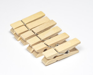Wooden Cloth Pegs with on White Background.