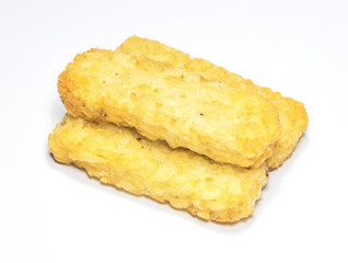 Hash brown pattie on white background..