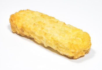 Hash brown pattie on white background..