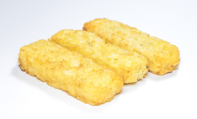 Hash brown pattie on white background..