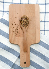 pepper seed in wooden spoon