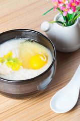 congee with chicken and raw egg