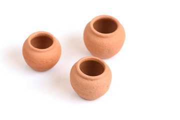 Clay pots on white background