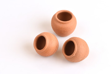 Clay pots on white background.