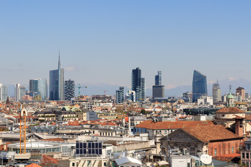 Fototapeta na wymiar View of Milan skyline with mountains in the background