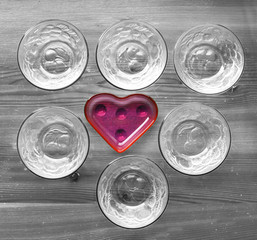 kitchen dishes with one standing out of crowd