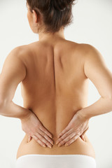 Naklejka premium Studio Shot Of Woman With Painful Back