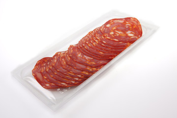 Slices of red chorizo on the package