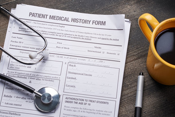Medical documents on wooden table