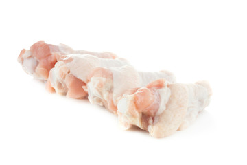 raw chicken meat with bone on a white background