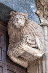 Statue of a Lion holding a Lamb at Monza Cathedral