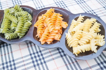 Multicolor fusilli prepare for pasta cuisine