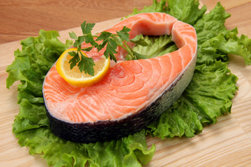 served piece of fresh salmon steak
