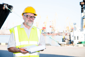 Engineer at a construction site in the port