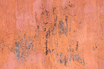 scratched orange metal surface