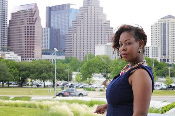 African American woman on Austin, Texas cityscape