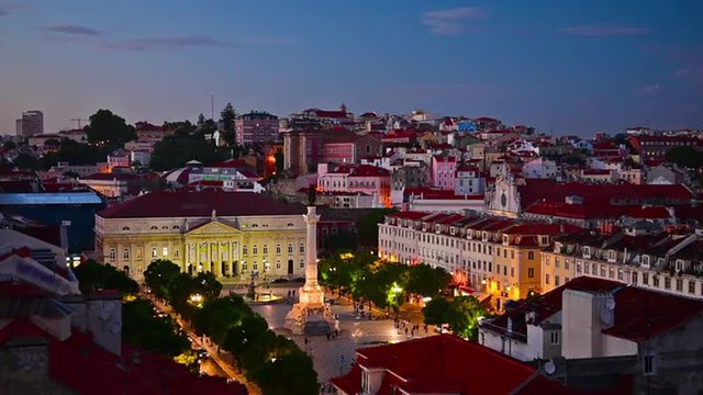 Lisbon, Portugal cityscape over Rossio Square at twilight.