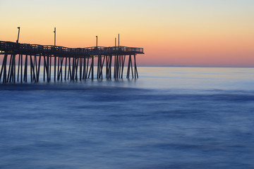 Fishing Pier and Smooth Ocean at Sunrise