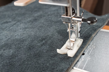 sewing machine foot and item of clothing