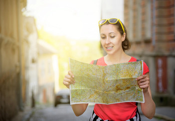 Travel tourist woman with  map.