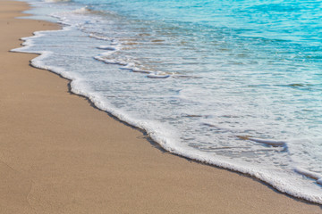 Wave of sea on the sand beach
