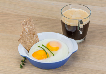 Breakfast with eggs and coffee