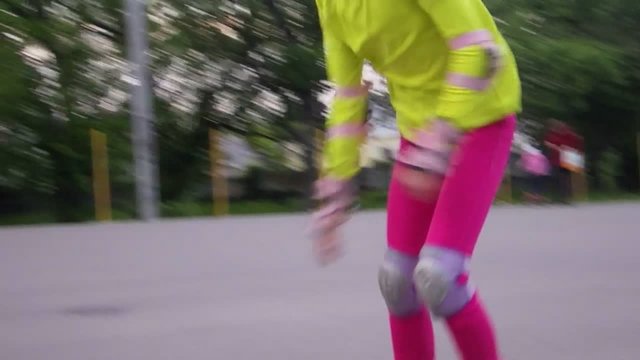 portrait of a sportive child inline skates blading