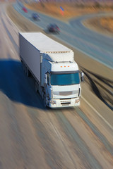 truck moves on highway © Yuri Bizgaimer