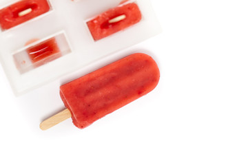 Frozen Strawberry Fruit Bars on white background.