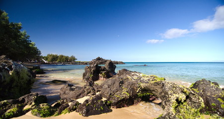 Obraz premium Rocks near surf line of Beach 69