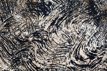 Black volcanic sand background on the wall