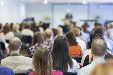 Bisiness Concept: Group of People Listening on a Conference Hall
