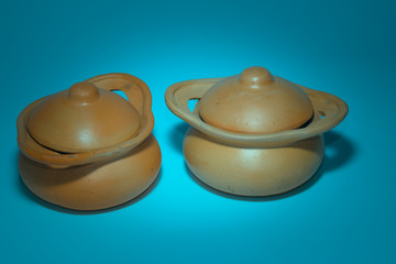 Fototapeta premium the clay pot on paper background