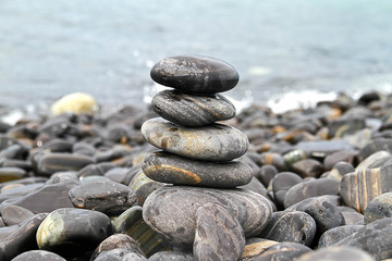 Fototapeta na wymiar Stack of stones on beach