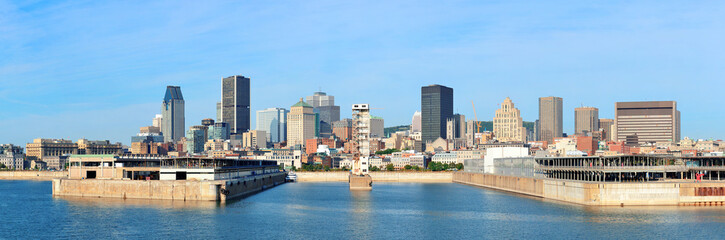 Montreal city skyline over river panorama