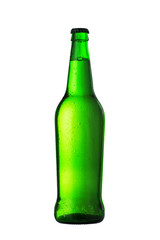 Green bottle of beer with drops on white background