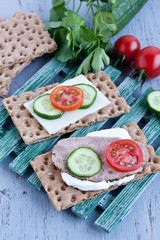 crisp bread with cheese and smoked turkey meat