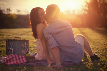 Attractive couple in the sunset