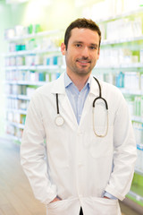 Portrait of an attractive pharmacist at work